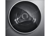 a washing machine with the front door open and the front door open