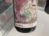a bottle of wine that has a picture on it
