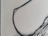 a black and white drawing of a woman ' s breast