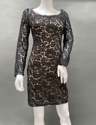 a mannequin mannequin dress with long sleeves and black lace