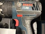 a cordless drill that is sitting in a box