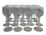 a lot of empty wine glasses sitting on a table