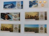 a lot of stamps on the wall with pictures of different countries