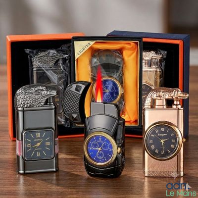 three different types of watches and a lighter in a box
