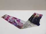 a pair of leggings that are laying on a table