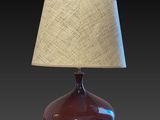 une photo d'une lampe de table équipée d'un abat-jour en burlock