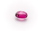 a pink tourmaline gems on a white background