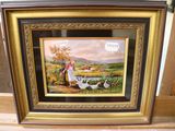 tableau représentant une femme et deux chiens dans un décor champêtre