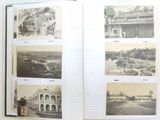 an open book with pictures of buildings on it