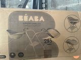 a cardboard box with a picture of a baby stroller in it
