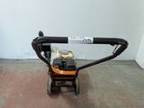 a small machine that is sitting on the floor