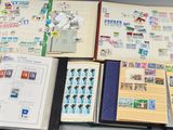a lot of stamps on the pages of a book