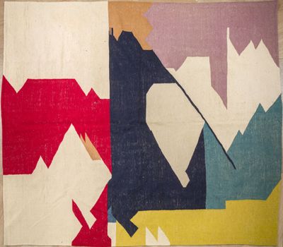 an image of a colorful rug with geometric shapes