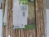 a bunch of bamboo sticks wrapped in plastic