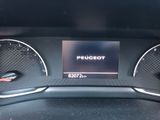 the dashboard of a car with a digital display in the center