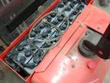 a machine that is sitting on the floor in the room