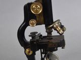 a close up of a microscope on a table