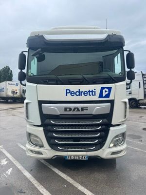 a picture of a white truck parked in a parking lot