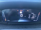 the dashboard of a car with a digital display on it