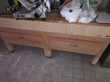 a kitchen counter with a bunch of items on top of it