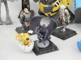 many figurines of different types and sizes on the table