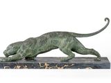 statue of a running cat on a marble base on a white background