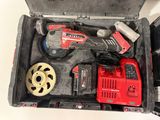 a tool box with tools in it on a table