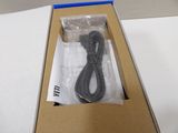 a box with a cord in it on a table