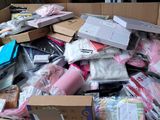 a cardboard box filled with many different types of electronic devices