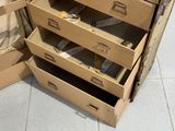a stack of cardboard boxes that are stacked on top of each other