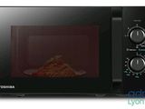 a black microwave with a plate of food inside of it