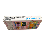 a box of nintendo wii games sitting on a white surface