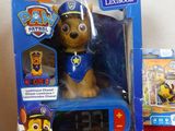 a toy dog that is sitting on top of a table