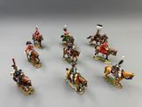 plusieurs figurines représentant des soldats à cheval tenant des drapeaux