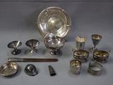 a lot of silver items that are on the table