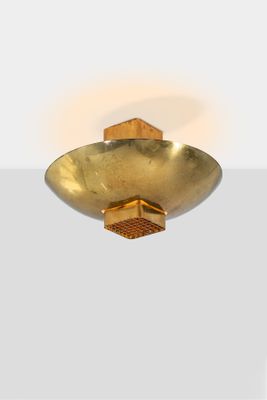 an image of a ceiling light with a gold finish