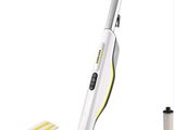 a white and black steam mop and cleaning supplies on a white background