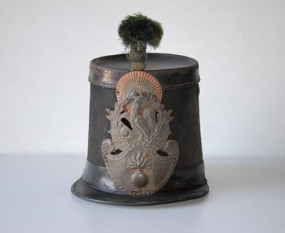 a small pot with a plant in it on a table