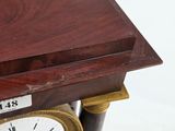 a clock that is sitting on top of a table