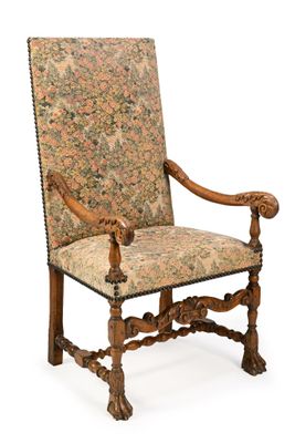 une image d'une chaise avec un dossier et des accoudoirs tapissés de fleurs