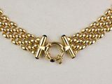 a close up of a gold chain necklace on a mannequin mannequin mannequin mannequin mannequin mannequin mannequin mann