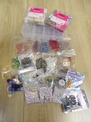 a lot of different items in the bag on the table
