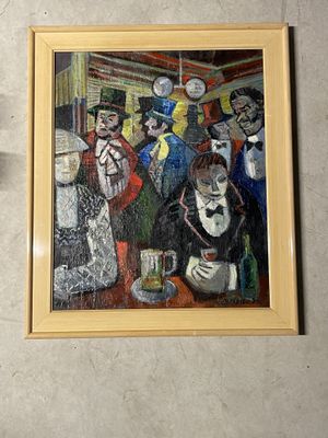 une photo d'un tableau accroché au mur à côté d'une horloge