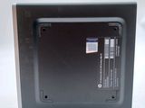 a picture of a laptop with a hard drive attached to it