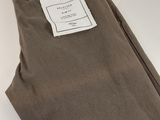 a close up of a pair of brown pants on a white surface