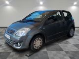 a picture of a small car parked in a garage