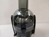a black and silver juicer sitting on a table