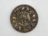 an image of a silver coin with a picture of a man on a horse