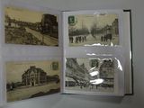 a book opened to show pictures of old buildings
