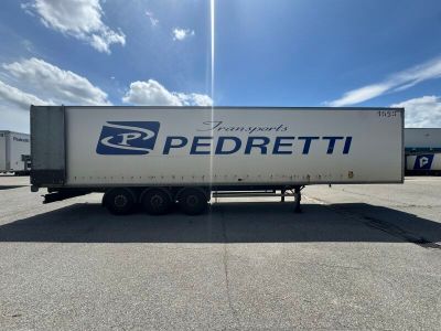 a semi truck that is parked in a parking lot
